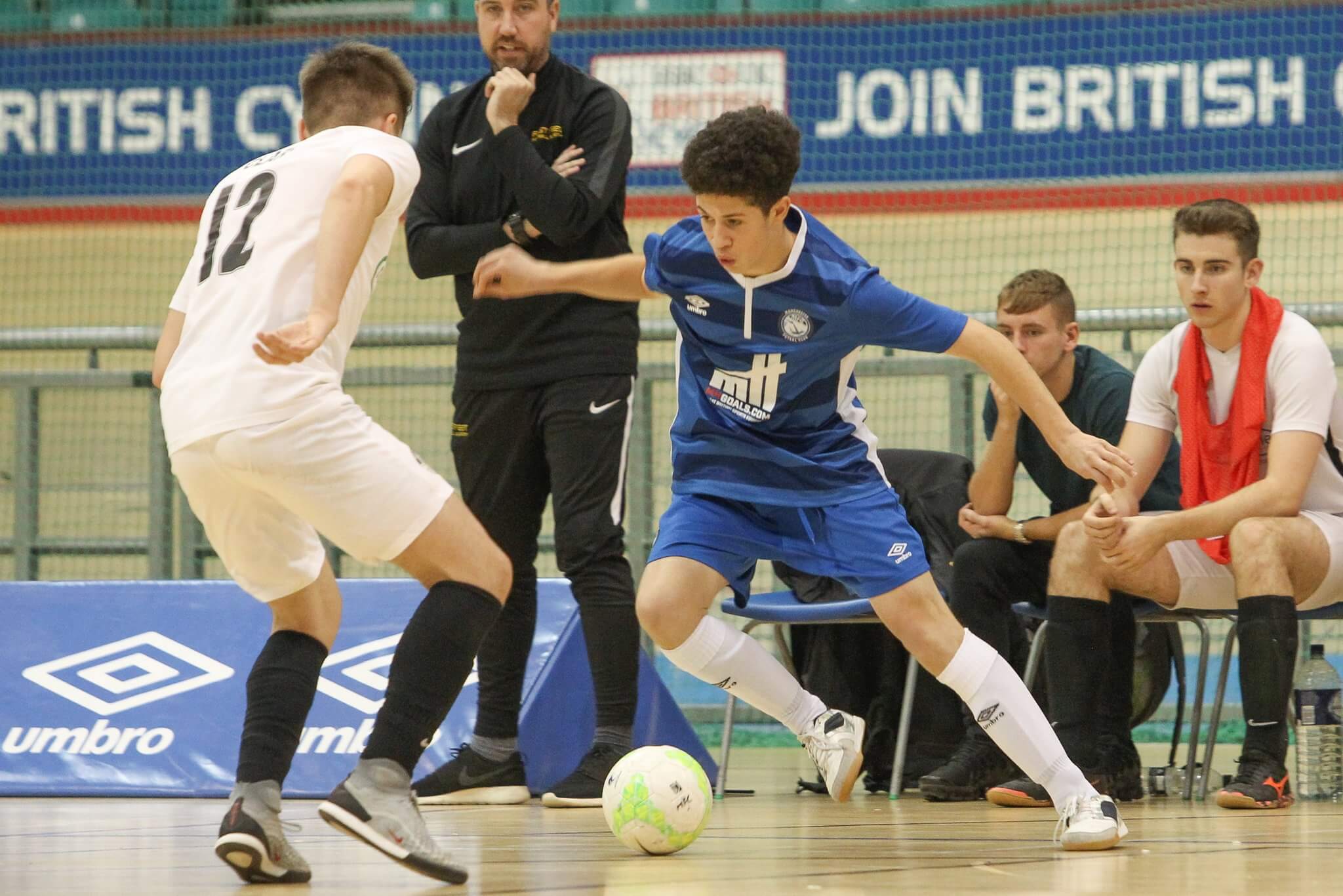 boys playing futsal in hall - insiresport image